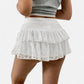 Jupe courte en dentelle blanche