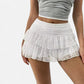 Jupe courte en dentelle blanche