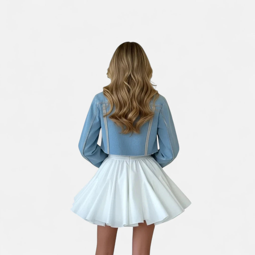 Mini jupe blanche plissée